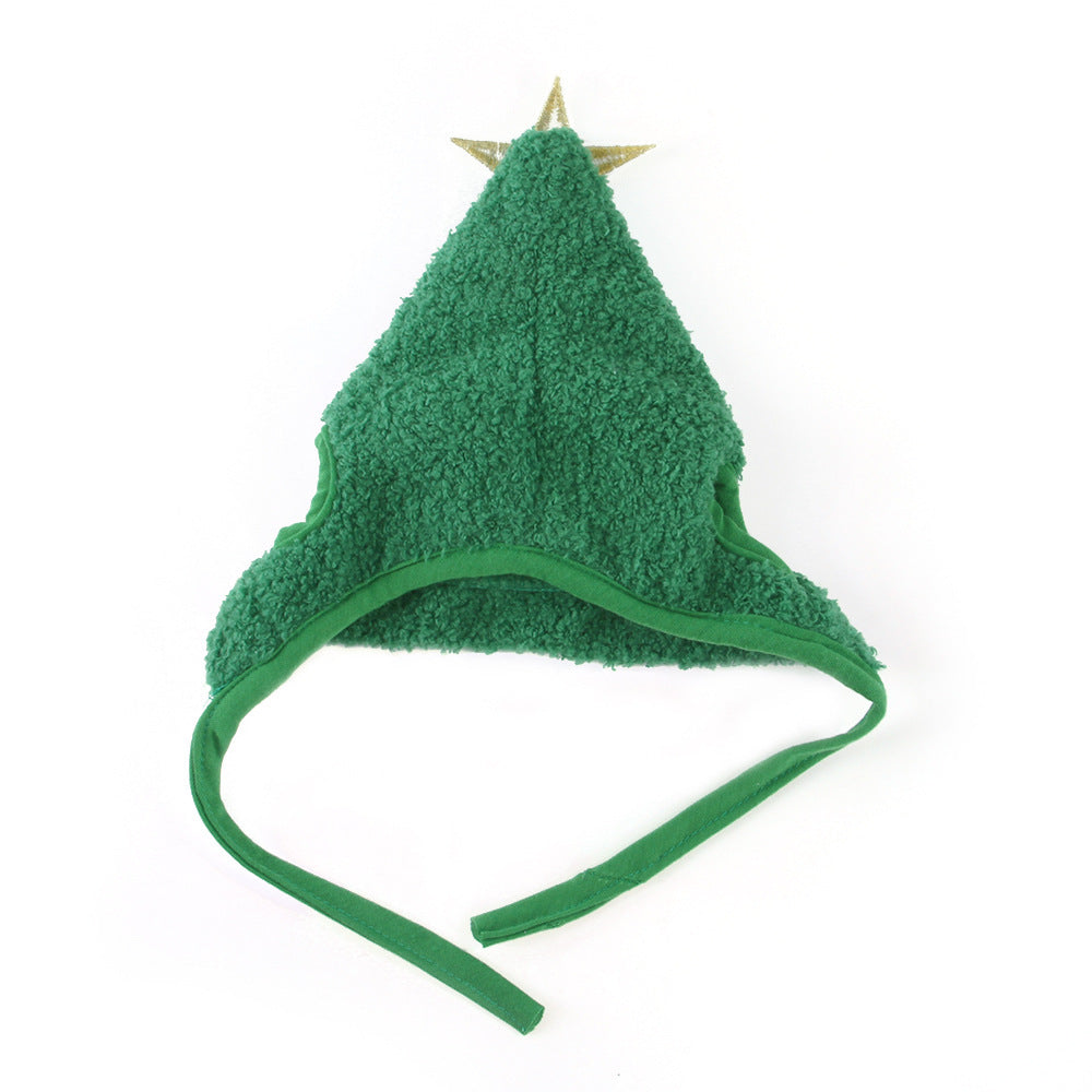 Green tree-shaped hat with a star on top against a white background